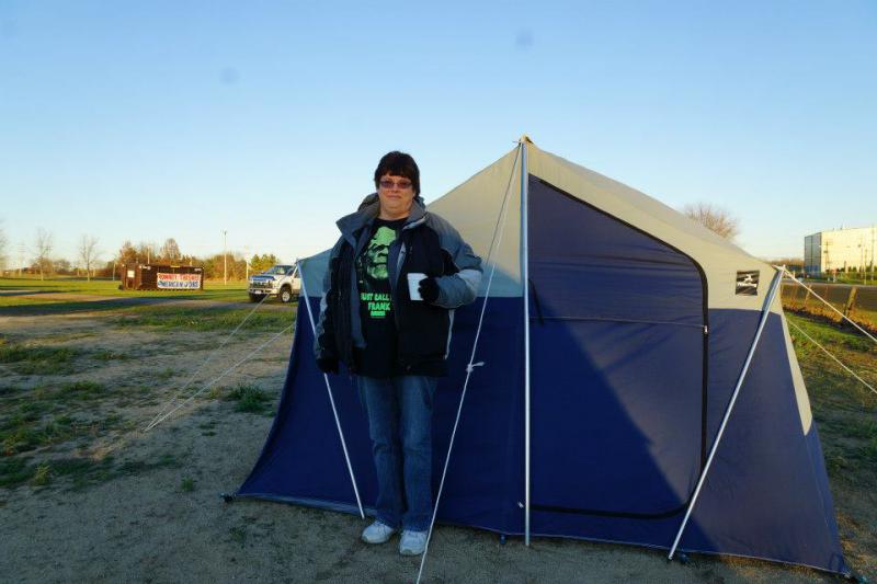 Bonnie Borman standing outside of her tent in Bainport (Source: Leslie Peterson)