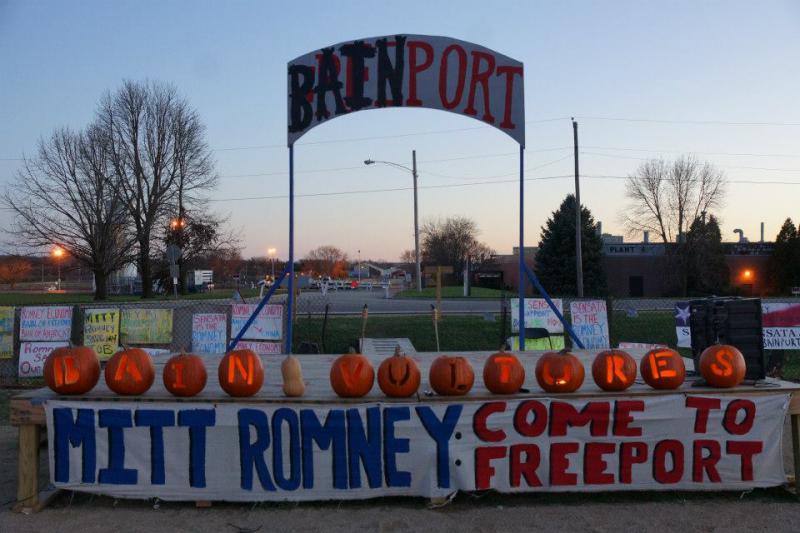 image of the stage at Bainport with pumpkins that spell out Bain Vultures and sign that says Mitt Romney: Come to Freeport