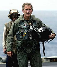 Bush in flight suit on the U.S.S. Abraham Lincoln