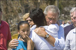 President Bush hugs Katrina victims in Biloxi, Miss. (<a href="http://www.whitehouse.gov/infocus/hurricane/photoessays/2005/essay2/01.html" target="_blank">White House photo</a>)
