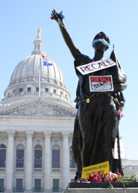 Signs adorning Miss Forward outside of the Wisconsin State Capitol yesterday (Photo by Lynn Welch)