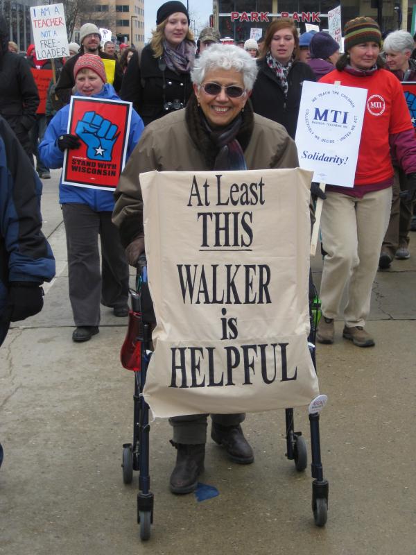 At Least This Walker Is Helpful protest sign