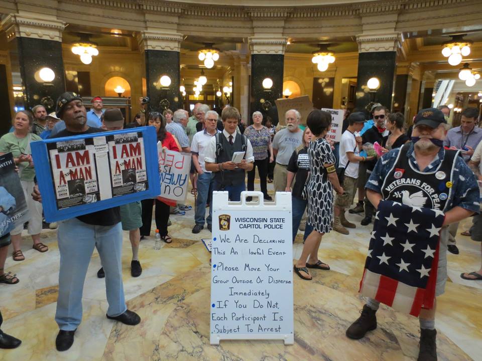 Veterans For Peace stand tall in the Wisconsin Capitol rotunda