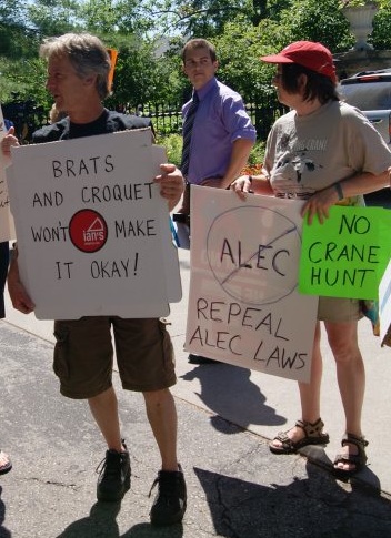 "Brats and croquet won't make it ok" and "Repeal ALEC laws" (source: Leslie Peterson)