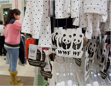 Tags on clothing for sale at J.C. Penney that promise a donation to WWF.