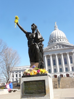 Miss Forward surrounded by flowers