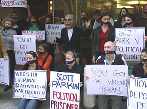 A protest against the arrest and deportation of Scott Parkin