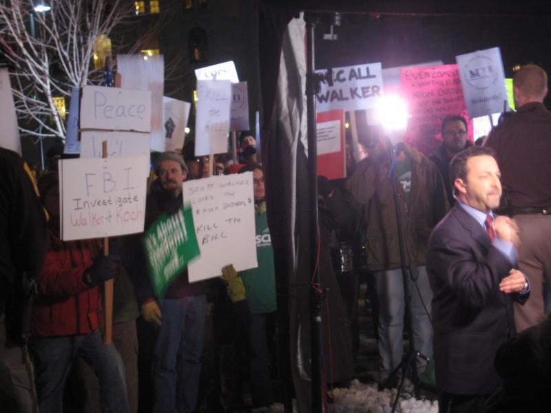 Rep. Scott Suder (R-69, Abbotsford) flocked by protestors