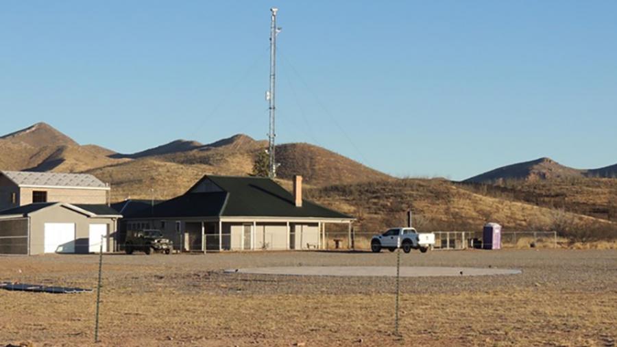 Howard Buffett's Christiansen Ranch, reminiscent of a paramilitary compound, is about 300 yards from the border wall. (Beau Hodai)