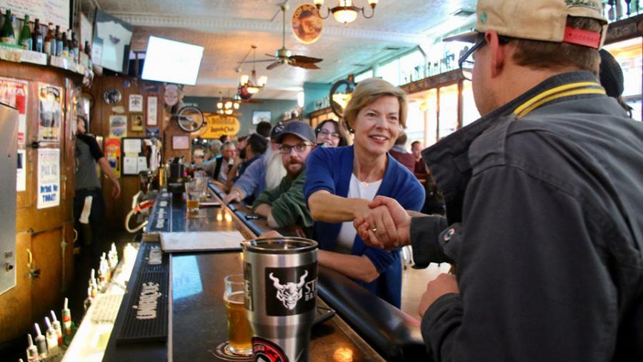 Tammy Baldwin having a beer at Bodega Brew Pub in La Crosse