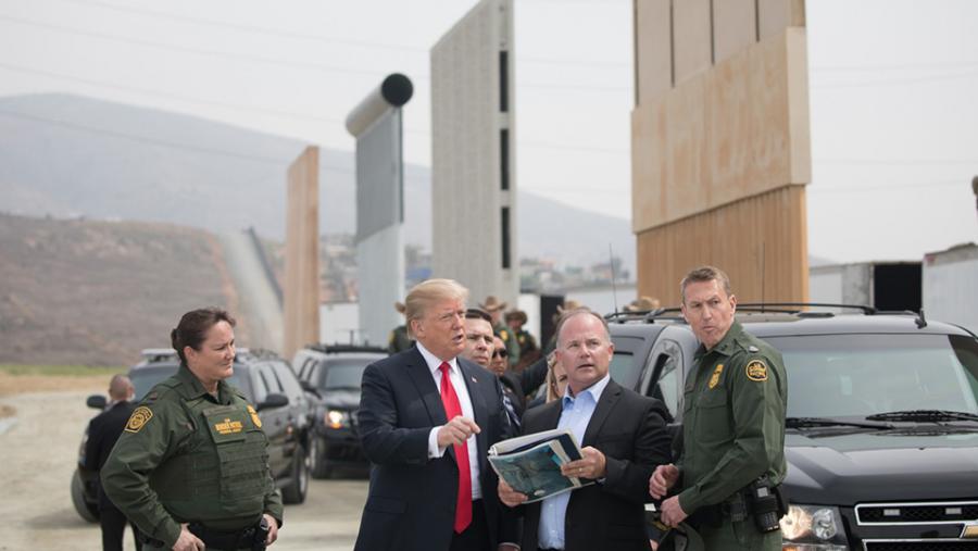 Trump examines border wall prototypes in San Diego.